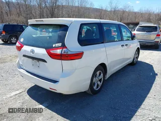 2015 Toyota Sienna L with VIN 5TDZK3DC3FS690484, listed as a IAAI auction lot 41888073 with 201,518 mi miles and . Bid and sale history available at carsss.com. Image 4.