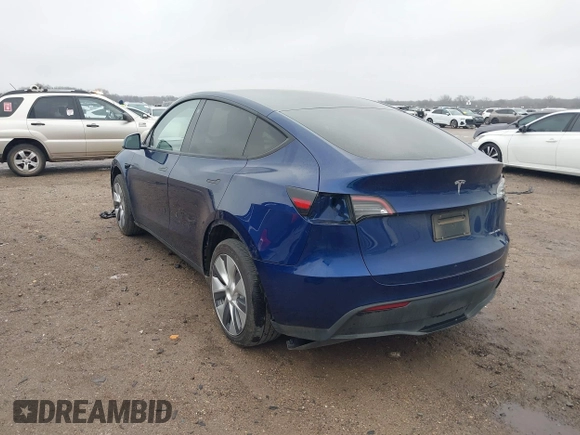 2023 Tesla Model Y Long Range with VIN 7SAYGDEE4PA064743, listed as a IAAI auction lot 41523760 with 41,113 mi miles. Bid and sale history available at carsss.com. Image 3.