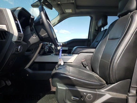 2017 Ford F-150 XL with VIN 1FTEW1EF6HFA17806, listed as a Copart auction lot 51717025 with 143,203 mi miles and Salvage Title. Bid and sale history available at carsss.com. Image 7.