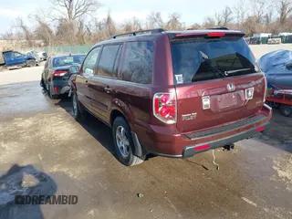 2007 Honda Pilot EX-L with VIN 5FNYF18647B004936, listed as a IAAI auction lot 41656465 with 225,580 mi miles and . Bid and sale history available at DreamBid. Image 3.