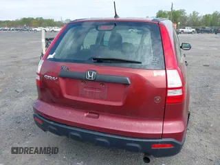 2007 Honda CR-V LX with VIN JHLRE38327C040004, listed as a IAAI auction lot 42084244 with 271,363 mi miles. Bid and sale history available at carsss.com. Image 17.