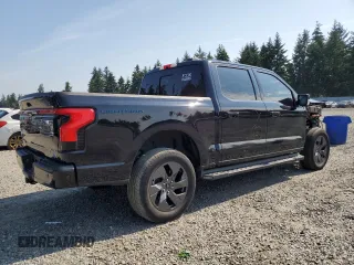 2023 Ford F-150 Lightning Pro with VIN 1FTVW1EV5PWG63666, listed as a Copart auction lot 60998415 with 35,089 mi miles and Salvage title. Bid and sale history available at DreamBid. Image 3.
