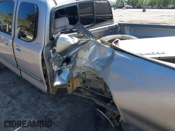 2003 Toyota Tundra SR5 with VIN 5TBRT34163S353209, listed as a IAAI auction lot 41819411 with 272,127 mi miles and . Bid and sale history available at DreamBid. Image 6.