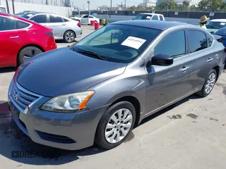 2015 Nissan Sentra S with VIN 3N1AB7AP6FY290586, listed as a IAAI auction lot 42014054 with 127,465 mi miles. Bid and sale history available at carsss.com. Image 2.