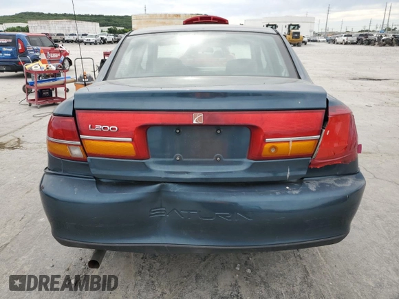 2002 Saturn LS z VIN 1G8JU54F12Y528956, wystawiony jako Copart lot #57295375 z przebiegiem 89 879 mil mil oraz Szkoda całkowita • Salvage title. Historia ofert i sprzedaży dostępna na DreamBid. Obrazek 6.
