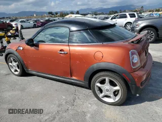 2013 MINI Coupe S z VIN WMWSX3C59DT466802, wystawiony jako Copart lot #56860965 z przebiegiem 88 053 mil mil oraz Szkoda całkowita • Salvage title. Historia ofert i sprzedaży dostępna na DreamBid. Obrazek 2.