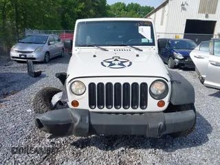 2009 Jeep Wrangler X with VIN 1J4FA24119L727658, listed as a IAAI auction lot 42372855 with 145,450 mi miles and . Bid and sale history available at DreamBid. Image 6.