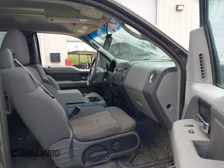 2004 Ford F-150 STX with VIN 1FTRX12W74NA20006, listed as a IAAI auction lot 42020664 with 169,603 mi miles and . Bid and sale history available at carsss.com. Image 5.