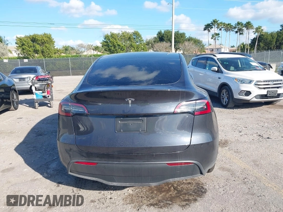 2025 Tesla Model Y Long Range with VIN 7SAYGDED4SF226776, listed as a IAAI auction lot 41514317 with 1,636 mi miles and . Bid and sale history available at DreamBid. Image 17.