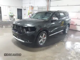 2012 Dodge Durango Citadel with VIN 1C4RDJEG8CC292006, listed as a IAAI auction lot 41553408 with 147,954 mi miles and . Bid and sale history available at DreamBid. Image 18.