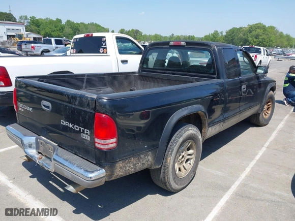 2004 Dodge Dakota SLT with VIN 1D7GL42N14S527342, listed as a IAAI auction lot 42081956 with 165,157 mi miles. Bid and sale history available at carsss.com. Image 4.