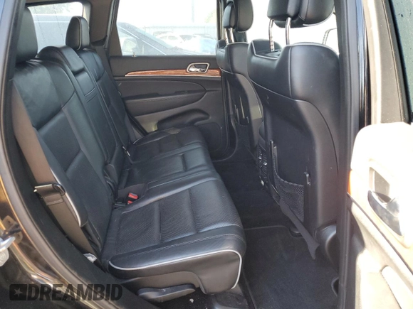 2013 Jeep Grand Cherokee Overland with VIN 1C4RJFCG2DC653207, listed as a Copart auction lot 48680885 with 276,020 mi miles and Salvage Title. Bid and sale history available at carsss.com. Image 11.