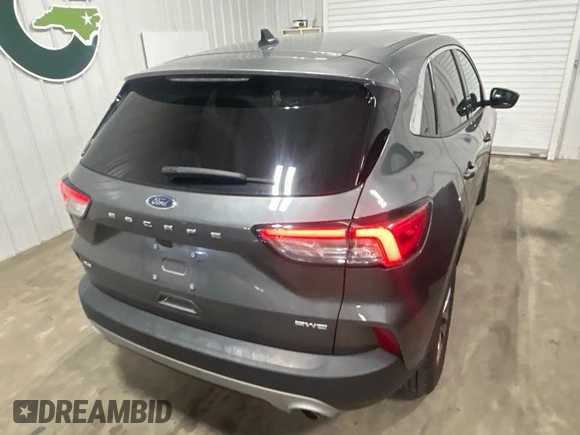 2022 Ford Escape SE with VIN 1FMCU9G64NUB35395, listed as a IAAI auction lot 42234045 with 101,184 mi miles and . Bid and sale history available at carsss.com. Image 1.