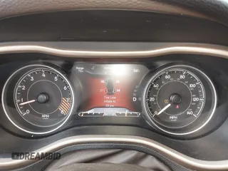 2014 Jeep Cherokee Trailhawk with VIN 1C4PJMBS6EW100500, listed as a IAAI auction lot 41894989 with 131,034 mi miles. Bid and sale history available at carsss.com. Image 7.