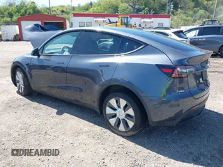 2023 Tesla Model Y Long Range z VIN 7SAYGDEE8PA191415, wystawiony jako IAAI lot #42155577 z przebiegiem 42 149 mil mil oraz . Historia ofert i sprzedaży dostępna na DreamBid. Obrazek 3.