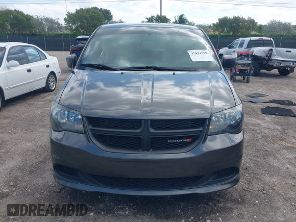 2015 Dodge Grand Caravan American Value with VIN 2C4RDGBGXFR682995, listed as a IAAI auction lot 41994708 with 142,725 mi miles and . Bid and sale history available at DreamBid. Image 12.