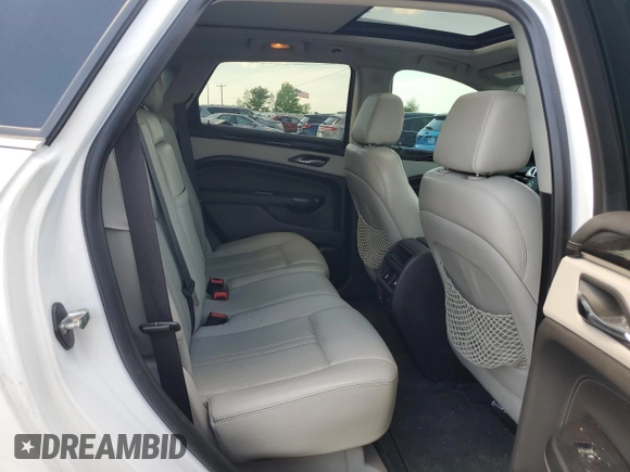 2016 Cadillac SRX Luxury Collection z VIN 3GYFNBE34GS505188, wystawiony jako Copart lot #56690805 z przebiegiem 121 935 mil mil oraz Czysty tytuł • Clean title. Historia ofert i sprzedaży dostępna na DreamBid. Obrazek 11.