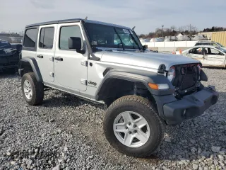 2023 Jeep Wrangler Willys with VIN 1C4HJXDG2PW671483, listed as a Copart auction lot 46990395 with 15,087 mi miles and Salvage Title. Bid and sale history available at DreamBid. Image 4.