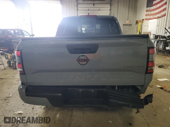 2022 Nissan Frontier Pro-4X z VIN 1N6ED1EK4NN674895, wystawiony jako Copart lot #54838395 z przebiegiem 44 867 mil mil oraz Szkoda całkowita • Salvage title. Historia ofert i sprzedaży dostępna na DreamBid. Obrazek 6.