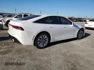 2022 Toyota Mirai XLE с VIN JTDAAAAA0NA007370, выставлен на аукционе Copart как лот 40441584 с пробегом 3 940 миль миль и . История ставок и продаж доступна на DreamBid. Изображение 3.