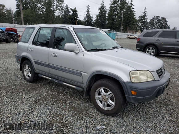1999 Honda CR-V EX with VIN JHLRD1866XC074271, listed as a Copart auction lot 68741914 with 296,297 mi miles and Salvage Title. Bid and sale history available at carsss.com. Image 4.