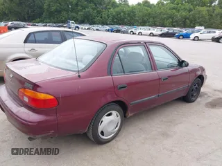 1998 Chevrolet Prizm Lsi z VIN 1Y1SK528XWZ423879, wystawiony jako IAAI lot #42522200 z przebiegiem 171 445 mil mil oraz . Historia ofert i sprzedaży dostępna na DreamBid. Obrazek 4.