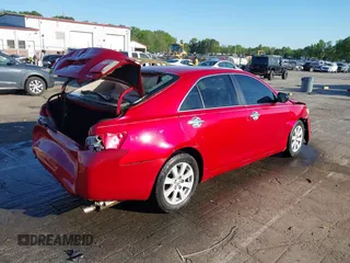 2007 Toyota Camry CE z VIN 4T1BE46K17U137909, wystawiony jako IAAI lot #41988503 z przebiegiem 244 703 mil mil oraz . Historia ofert i sprzedaży dostępna na DreamBid. Obrazek 4.