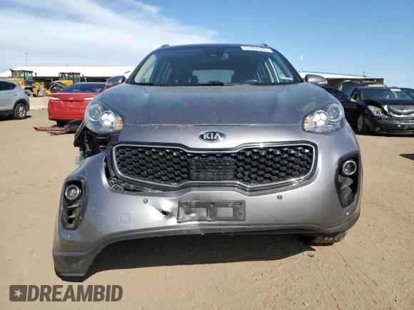 2019 Kia Sportage EX z VIN KNDPNCAC3K7547199, wystawiony jako Copart lot #53388485 z przebiegiem 74 727 mil mil oraz Szkoda całkowita • Salvage title. Historia ofert i sprzedaży dostępna na DreamBid. Obrazek 5.