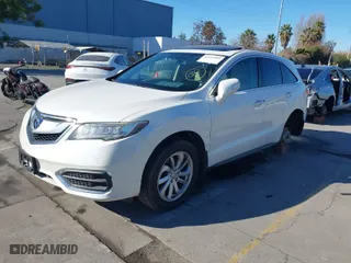 2016 Acura RDX with VIN 5J8TB3H35GL002912, listed as a IAAI auction lot 41344983 with 100,123 mi miles. Bid and sale history available at carsss.com. Image 2.