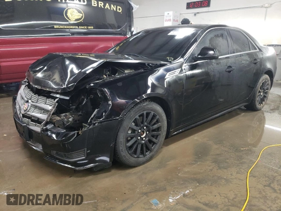 2010 Cadillac CTS Sedan with VIN 1G6DC5EG4A0134266, listed as a Copart auction lot 84228924 with 144,213 mi miles and Salvage Title. Bid and sale history available at carsss.com. Image 1.