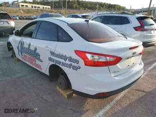 2014 Ford Focus SE with VIN 1FADP3F28EL455827, listed as a IAAI auction lot 41658258 with 1 mi miles. Bid and sale history available at carsss.com. Image 3.