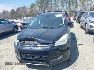 2016 Ford Escape Titanium with VIN 1FMCU0JX8GUC06601, listed as a IAAI auction lot 41785774 with 121,427 mi miles. Bid and sale history available at carsss.com. Image 12.