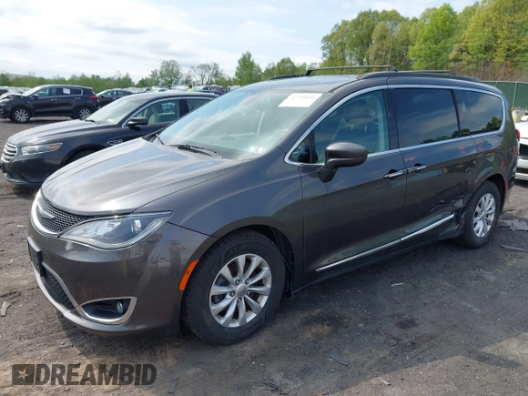 2017 Chrysler Pacifica Touring L with VIN 2C4RC1BG5HR705277, listed as a IAAI auction lot 42230036 with 75,287 mi miles and . Bid and sale history available at DreamBid. Image 2.