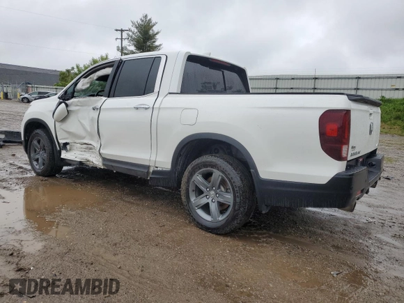 2023 Honda Ridgeline RTL-E with VIN 5FPYK3F78PB015187, listed as a Copart auction lot 57655465 with 57,704 mi miles and Salvage title. Bid and sale history available at DreamBid. Image 2.