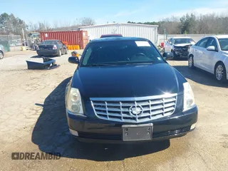 2006 Cadillac DTS Professional z VIN 1GEEH96Y56U550027, wystawiony jako IAAI lot #41663248 z przebiegiem 58 471 mil mil oraz . Historia ofert i sprzedaży dostępna na DreamBid. Obrazek 13.
