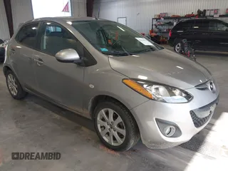 2014 Mazda 2 Touring z VIN JM1DE1LY2E0174833, wystawiony jako IAAI lot #42250632 z przebiegiem 90 168 mil mil oraz . Historia ofert i sprzedaży dostępna na DreamBid. Obrazek 1.