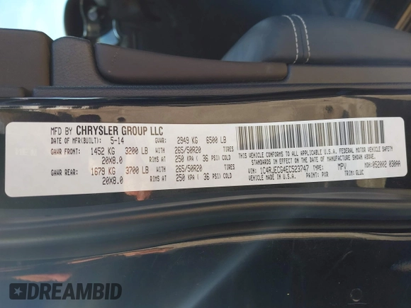 2014 Jeep Grand Cherokee Overland with VIN 1C4RJECG4EC523747, listed as a IAAI auction lot 40802143 with 124,079 mi miles. Bid and sale history available at carsss.com. Image 9.