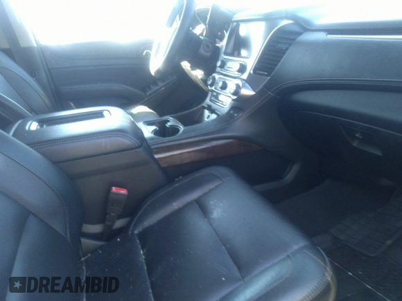 2019 Chevrolet Suburban LT with VIN 1GNSCHKCXKR405939, listed as a IAAI auction lot 41591475 with 106,554 mi miles and . Bid and sale history available at DreamBid. Image 5.