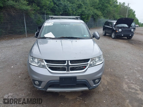 2017 Dodge Journey SXT with VIN 3C4PDDBG8HT577782, listed as a IAAI auction lot 42409731 with 136,618 mi miles and . Bid and sale history available at DreamBid. Image 11.