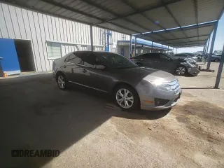 2012 Ford Fusion SE z VIN 3FAHP0HAXCR231865, wystawiony jako Copart lot #52644815 z przebiegiem 153 058 mil mil oraz Szkoda całkowita • Salvage title. Historia ofert i sprzedaży dostępna na DreamBid. Obrazek 10.