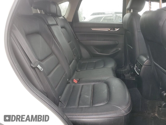 2019 Mazda CX-5 Grand Touring with VIN JM3KFBDM4K0669589, listed as a Copart auction lot 54948455 with 64,475 mi miles and Salvage Title. Bid and sale history available at carsss.com. Image 11.