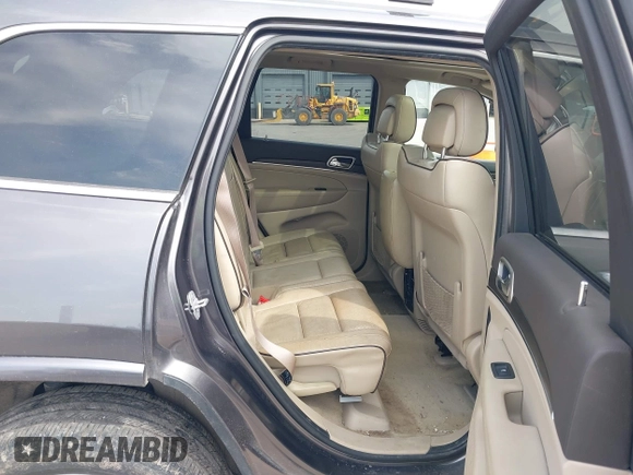 2014 Jeep Grand Cherokee Overland with VIN 1C4RJFCT6EC187098, listed as a IAAI auction lot 42077453 with 172,220 mi miles and . Bid and sale history available at DreamBid. Image 8.