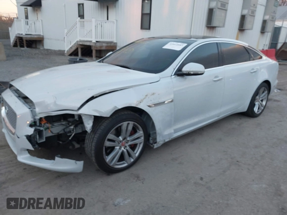 2017 Jaguar XJ with VIN SAJWJ2GD5H8W08395, listed as a IAAI auction lot 41014883 with 80,584 mi miles. Bid and sale history available at carsss.com. Image 17.