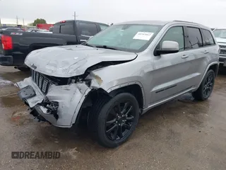 2020 Jeep Grand Cherokee Altitude with VIN 1C4RJEAG2LC392060, listed as a IAAI auction lot 40765662 with 30,505 mi miles and . Bid and sale history available at DreamBid. Image 2.