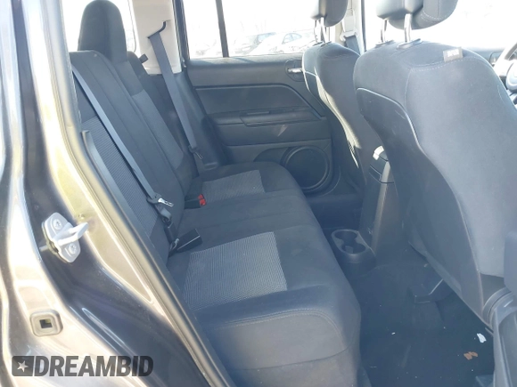 2015 Jeep Patriot Sport with VIN 1C4NJRBB1FD206631, listed as a IAAI auction lot 41703924 with 129,941 mi miles and . Bid and sale history available at carsss.com. Image 8.