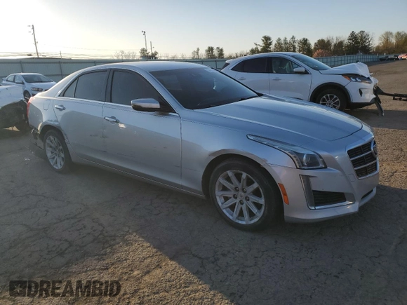 2014 Cadillac CTS Luxury AWD with VIN 1G6AX5S33E0197714, listed as a Copart auction lot 52496745 with 102,618 mi miles and Salvage Title. Bid and sale history available at DreamBid. Image 4.