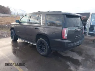 2015 GMC Yukon SLT with VIN 1GKS2BKC7FR110106, listed as a IAAI auction lot 41702260 with 108,679 mi miles. Bid and sale history available at carsss.com. Image 3.