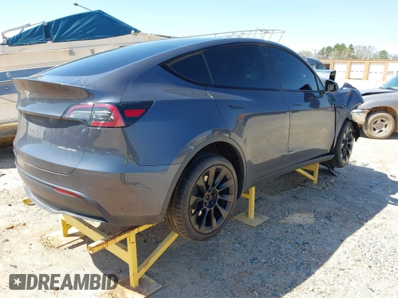 2022 Tesla Model Y Long Range with VIN 7SAYGDEE0NF387512, listed as a IAAI auction lot 41850901 with Not Provided miles and . Bid and sale history available at carsss.com. Image 4.