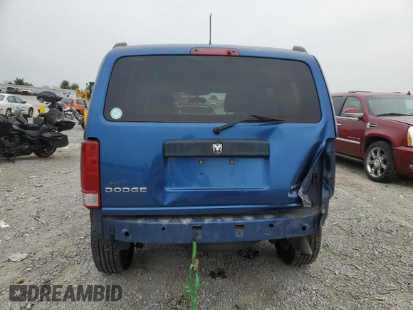 2009 Dodge Nitro SE with VIN 1D8GT28KX9W533248, listed as a Copart auction lot 70500994 with 124,091 mi miles and Salvage Title. Bid and sale history available at DreamBid. Image 6.