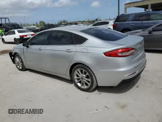 2019 Ford Fusion Hybrid SE with VIN 3FA6P0LUXKR107120, listed as a Copart auction lot 46972153 with 87,197 mi miles. Bid and sale history available at carsss.com. Image 2.